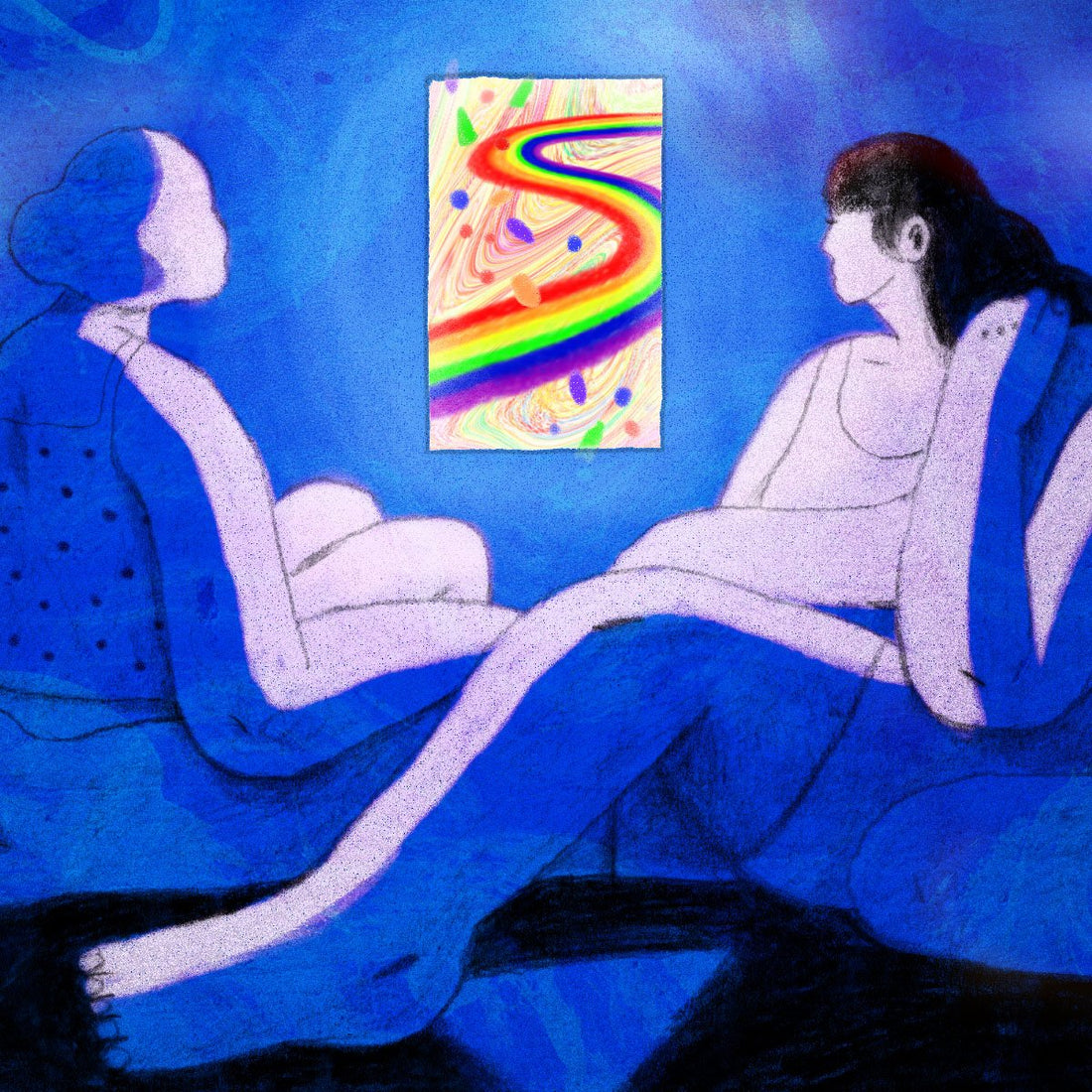 two people looking at a rainbow path