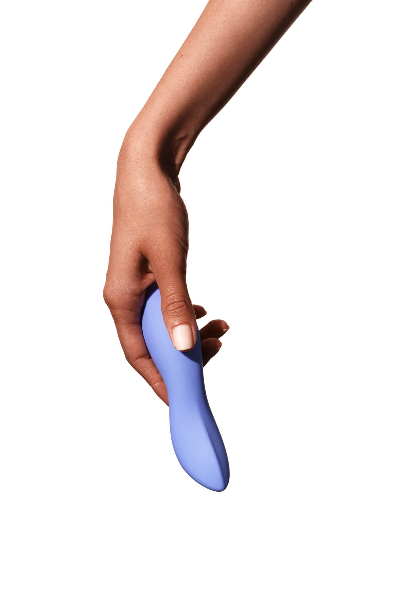 Periwinkle | Light blue vibrator being held by hand upside down on a beige background