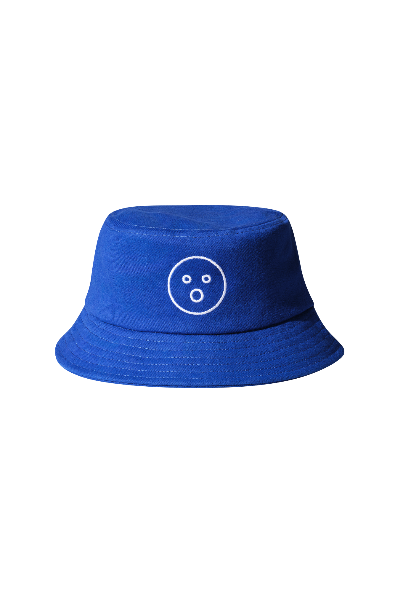 | A royal blue bucket hat with Dame's O-face embroidered onto it in white. Beige background.