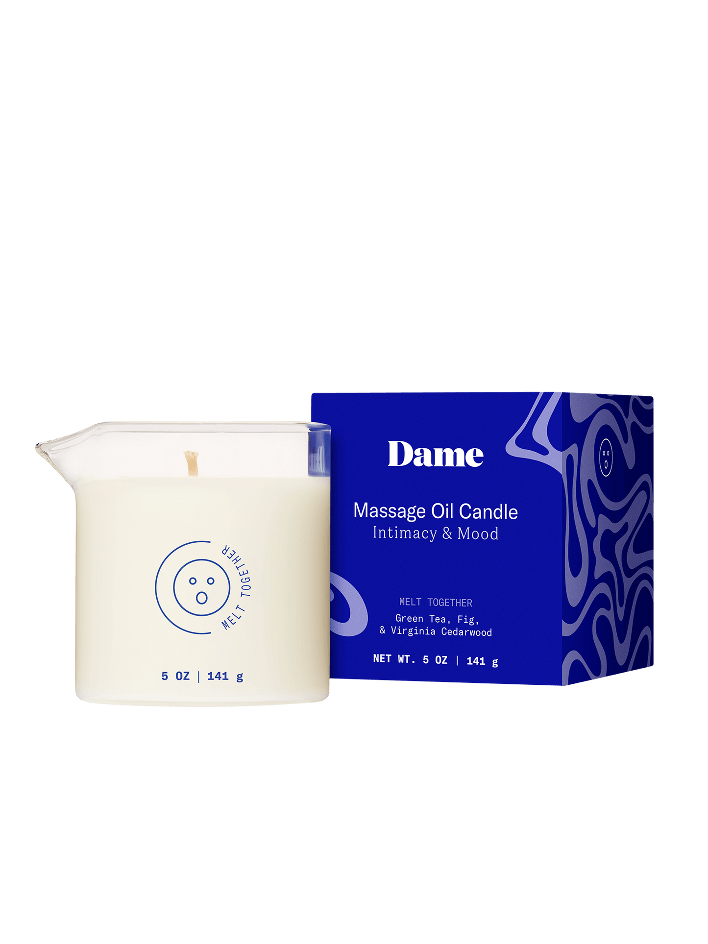 Melt Together | Dame Massage Oil Candle out of the box next to its blue packaging box