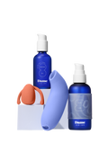 Seamless | Two blue bottles, one with a clear grip, next to two vibrators.