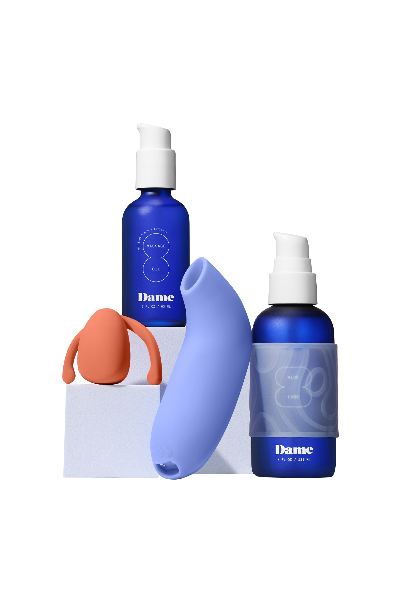 Seamless | Two blue bottles, one with a clear grip, next to two vibrators.